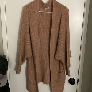 Fairly used light pink cardigan